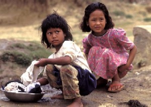girls washing clothes